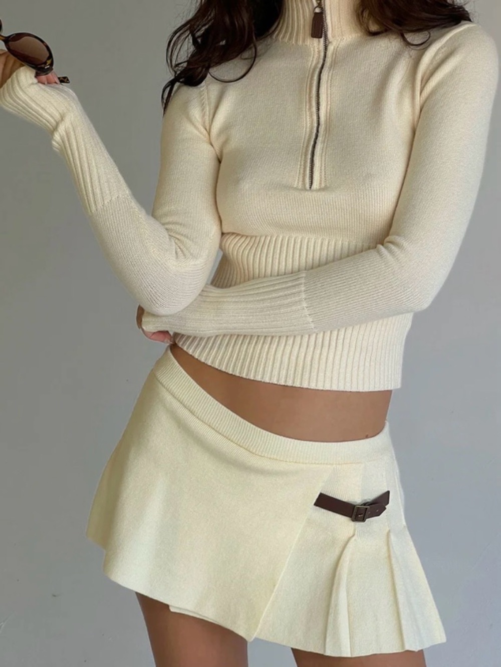 Frankie’s bikinis cloud knit half zip sweater and matching skort set